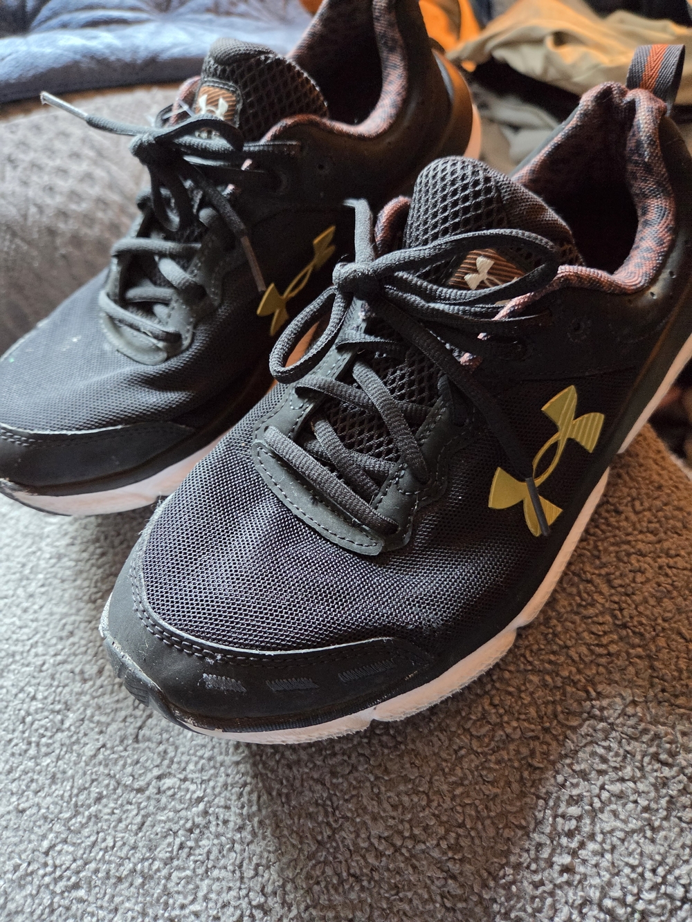 Under Armour Black and Gold Youth Athletic Sneakers